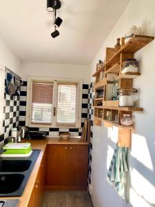 Η κουζίνα ή μικρή κουζίνα στο la Casa Amaranto