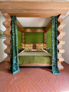 Postel nebo postele na pokoji v ubytování HuisXI