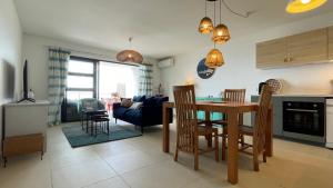 Kuchyň nebo kuchyňský kout v ubytování Flamboyant Punaauia, luxury apartment with splendid ocean view + 2 fotografie