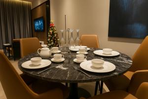 Принадлежности для чая и кофе в Antara Genting Highland premium Suite by ImooHome