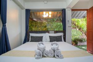 En eller flere senge i et værelse på Villa Moon Talay View + 185 billeder