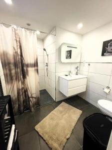 Et badeværelse på Ferienwohnung Auszeit