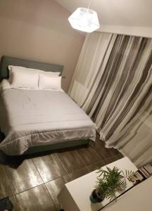 Фотография из галереи Kyra's Roof Terrace Flat в городе Mesochórion