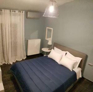 Фотография из галереи Kyra's Roof Terrace Flat в городе Mesochórion