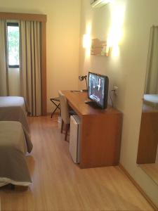 TV a/nebo společenská místnost v ubytování Cegil Hotel Boulevard