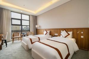 En eller flere senge i et værelse på Ben Thanh One Step Prime