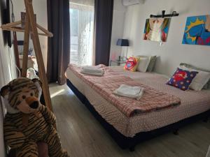 Postel nebo postele na pokoji v ubytování Guest House Casa Ramos on the Strip