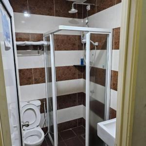 Koupelna v ubytování One Home Hotel + 62 fotografií