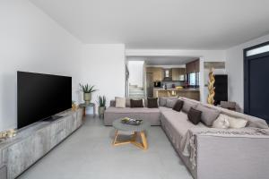 Μια τηλεόραση ή/και κέντρο ψυχαγωγίας στο Penélope Beachfront Villa