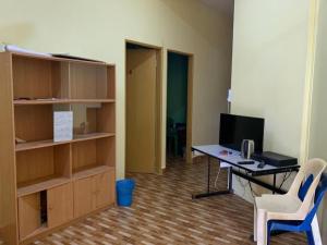 Un televizor și/sau centru de divertisment la SPOT ON 89986 P&p Inn