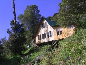 גינה חיצונית ב-Quetzal Valley Cabins