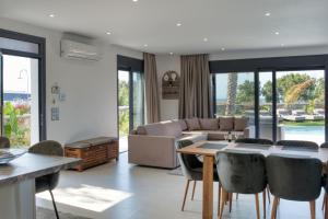 Χώρος καθιστικού στο Penélope Beachfront Villa