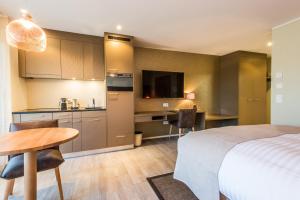Kuchyň nebo kuchyňský kout v ubytování Hotel My Way Zürich Wallisellen