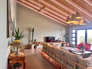 Et tv og/eller underholdning på Amasundu Beach House Trafalgar