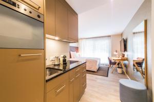 Kuchyň nebo kuchyňský kout v ubytování Hotel My Way Zürich Wallisellen