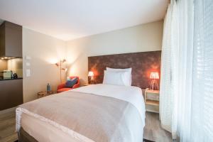 Postel nebo postele na pokoji v ubytování Hotel My Way Zürich Wallisellen