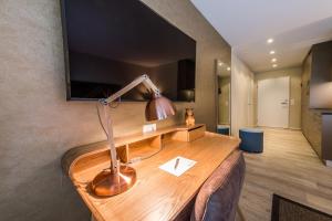 TV a/nebo společenská místnost v ubytování Hotel My Way Zürich Wallisellen