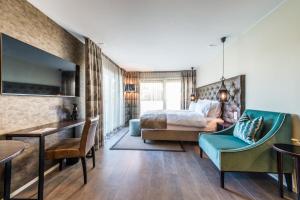 Postel nebo postele na pokoji v ubytování Hotel My Way Zürich Wallisellen