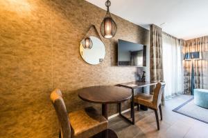 Postel nebo postele na pokoji v ubytování Hotel My Way Zürich Wallisellen