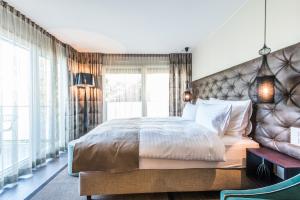 Postel nebo postele na pokoji v ubytování Hotel My Way Zürich Wallisellen