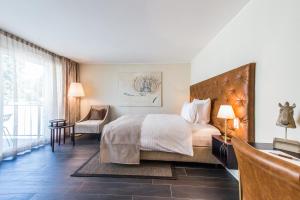 Postel nebo postele na pokoji v ubytování Hotel My Way Zürich Wallisellen