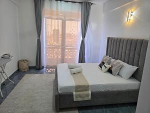 Ένα ή περισσότερα κρεβάτια σε δωμάτιο στο EL Nido