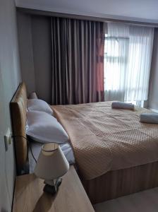 Кровать или кровати в номере White Peaks