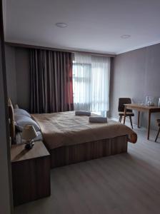 Кровать или кровати в номере White Peaks