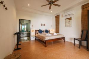 Postel nebo postele na pokoji v ubytování Villa Mar Koh Tao + 19 fotografií