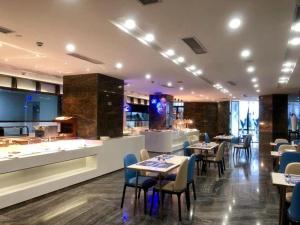 Posezení v ubytování Qingyuan Zhongkai Huafu Holiday Hotel