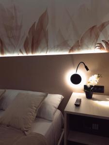 Giường trong phòng chung tại Pension Oasis Alicante