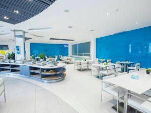 Restaurace v ubytování Jinjiang Inn Luoyang Wangcheng Park Metro Station