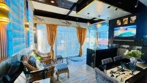 Μια τηλεόραση ή/και κέντρο ψυχαγωγίας στο RXS SkyPod #3 Suite Condotel - Roxas City