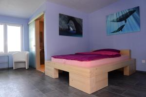 Postel nebo postele na pokoji v ubytování Hotel Belp Bern Airport Free Parking