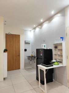 Кухня или мини-кухня в Riverine Resort Diamond, 7B-4Pax
