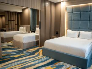 Ένα ή περισσότερα κρεβάτια σε δωμάτιο στο Van Royal Hotel +32 φωτογραφίες