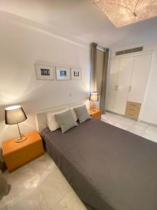 Ένα ή περισσότερα κρεβάτια σε δωμάτιο στο Sea view Penthouse Elysia park