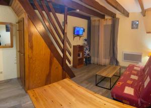 TV a/nebo společenská místnost v ubytování Appartement Barèges centre du village