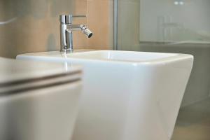 Koupelna v ubytování Dara Holiday Apartments + 142 fotografií