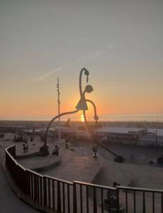 a skateboarder doing a trick at a skate park at Ocean Moments - Free Parking in Scheveningen +7 photos