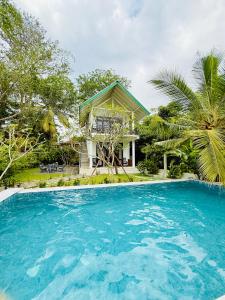 Swimmingpoolen hos eller tæt på Green Paradise Villa - Unawatuna