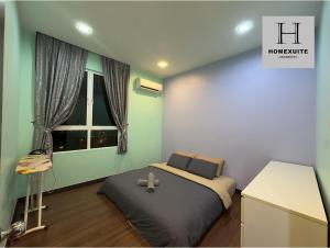 Postel nebo postele na pokoji v ubytování Homexuite Vacation at Utama South 3 + 18 fotografií