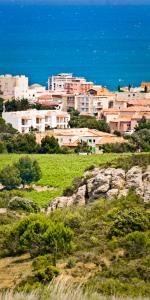 Foto da galeria de HOLIDAYLAND BAIE DES OLIVIERS VILLA 36m2 1chambre fermée 6 couchages ou VILLA 41M2 2chambres fermées 7 couchages em Narbonne Plage