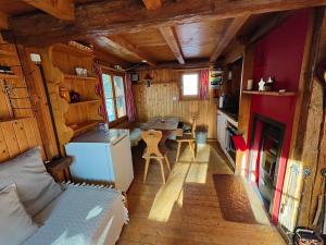 an aerial view of a kitchen and living room in a tiny house at Mazot de l' Arche de Noé in Verbier