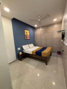 Una televisión o centro de entretenimiento en Hotel Anuha