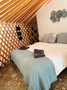 Postel nebo postele na pokoji v ubytování Finca Feliz Andaluz