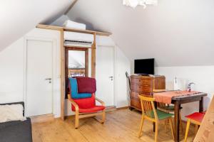 Телевизор и/или развлекательный центр в Tiny House an der Werra