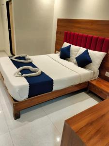 Una cama o camas en una habitación de Hotel Anuha 14 fotos más