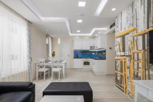 a living room with a couch and a table at Villa Jakov Apartments II in Promajna +30 photos