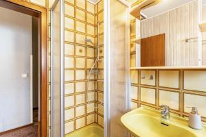 a bathroom with a sink and a shower at Ferienoase Balve in Balve +20 photos